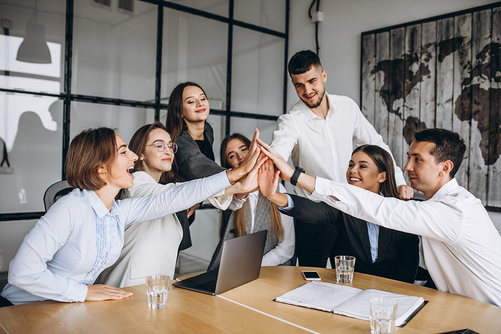 Event organizers collaborating around a table